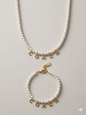 Coach Outlet Coach Charms Pearl Bracelet and Necklace